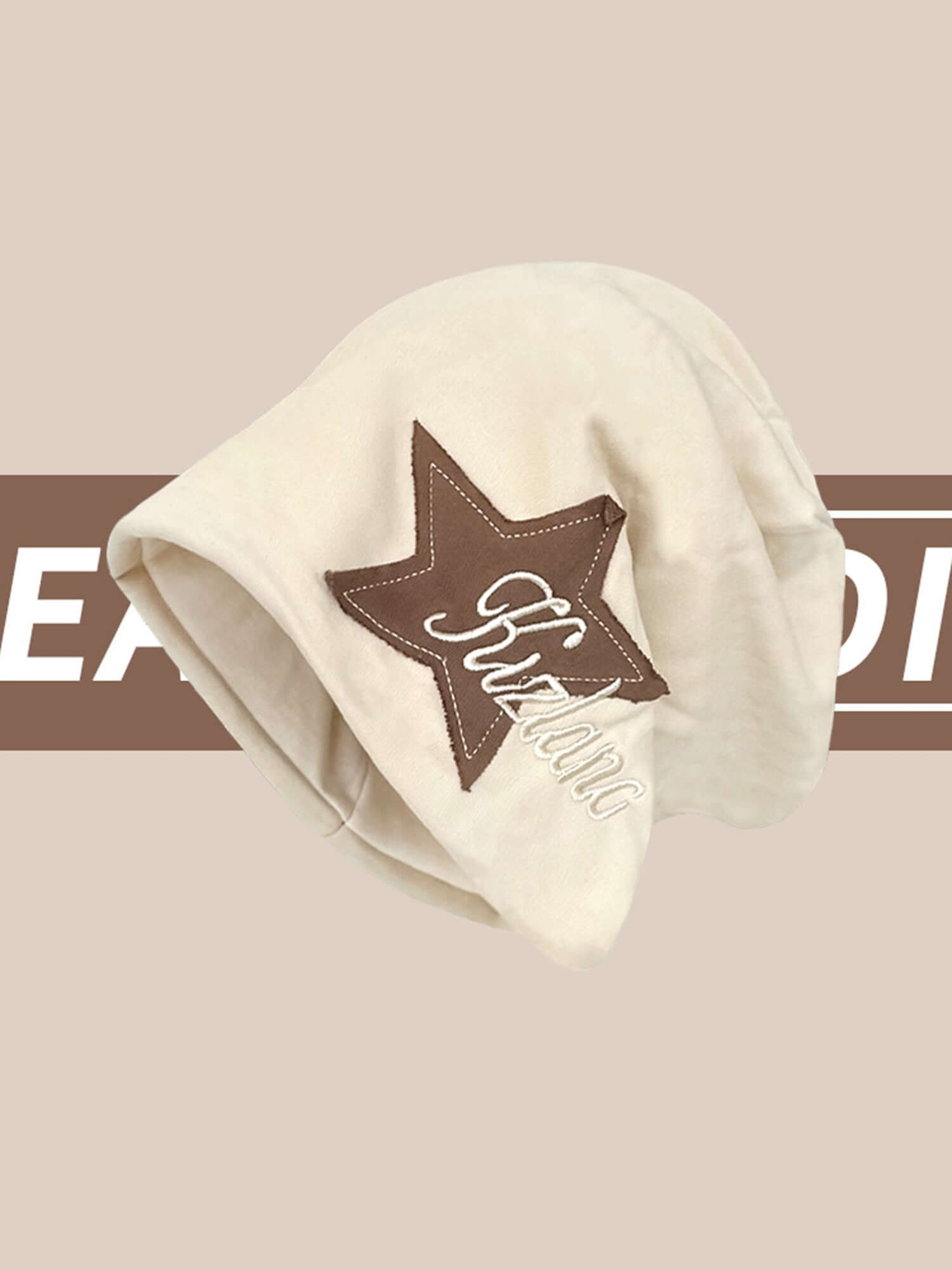 Add a playful edge to your outfit with the Star Embroidered Wrap Hat — the perfect blend of comfort and bold street style. Made from soft acrylic, this hat features a stylish pink star print, "Rockstar" text embroidery, and a stretchy fit that provides a