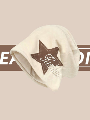 Add a playful edge to your outfit with the Star Embroidered Wrap Hat — the perfect blend of comfort and bold street style. Made from soft acrylic, this hat features a stylish pink star print, "Rockstar" text embroidery, and a stretchy fit that provides a