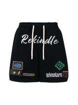 Add personality to your casual look with the Street Graphic Drawstring Shorts — a bold mix of comfort and creativity. Made from a soft cotton blend, these relaxed-fit shorts feature a colorful patchwork design with durable embroidered details, including a