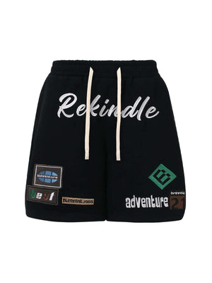 Add personality to your casual look with the Street Graphic Drawstring Shorts — a bold mix of comfort and creativity. Made from a soft cotton blend, these relaxed-fit shorts feature a colorful patchwork design with durable embroidered details, including a