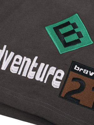 Add personality to your casual look with the Street Graphic Drawstring Shorts — a bold mix of comfort and creativity. Made from a soft cotton blend, these relaxed-fit shorts feature a colorful patchwork design with durable embroidered details, including a