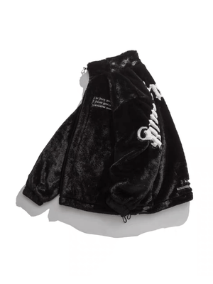 Make a bold impression with the Street Letter Embroidered Fleece Jacket. Crafted from ultra-soft faux fur, this oversized winter essential combines warmth, comfort, and eye-catching streetwear design. The jacket features bold embroidered text across the b