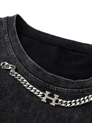 Add raw energy to your streetwear lineup with the Vintage Metallic Phantom Letter Distressed Washed Vest. Crafted from a soft and breathable cotton blend, this sleeveless vest features bold metallic-inspired graphic prints and distressed washed details fo