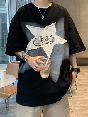 Add a touch of vintage flair to your everyday outfit with the Vintage Star Loose T Shirt. Crafted from a soft and breathable cotton blend, this relaxed-fit tee features a bold star graphic and slogan detail that bring effortless streetwear attitude. With