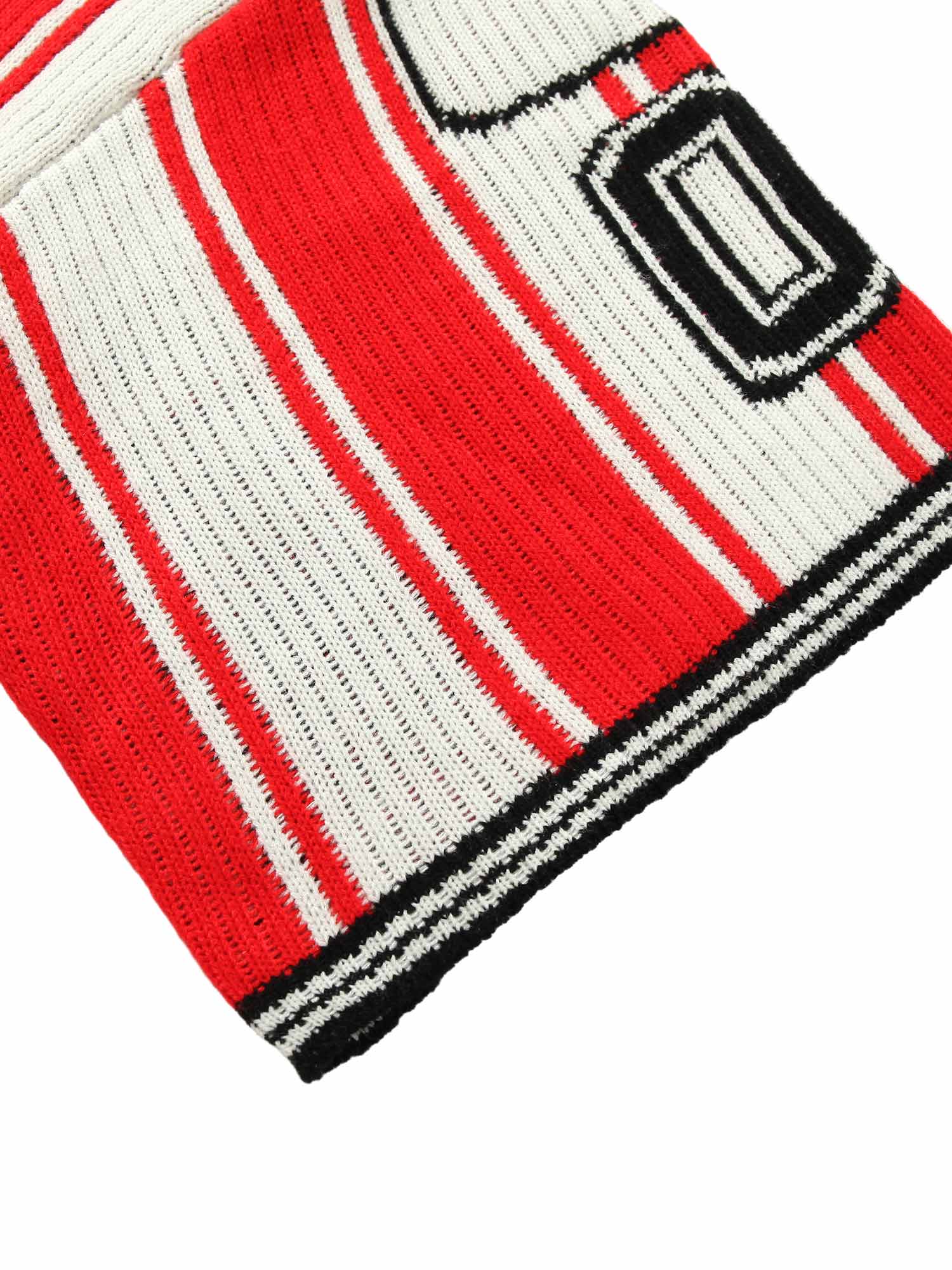 Bring retro energy to your wardrobe with the Vintage Striped Baseball Short Sleeved Knit Sweater. Featuring bold red and white stripes, a classic number 17 print, and contrasting ribbed details, this sporty top channels timeless athletic style. Made from