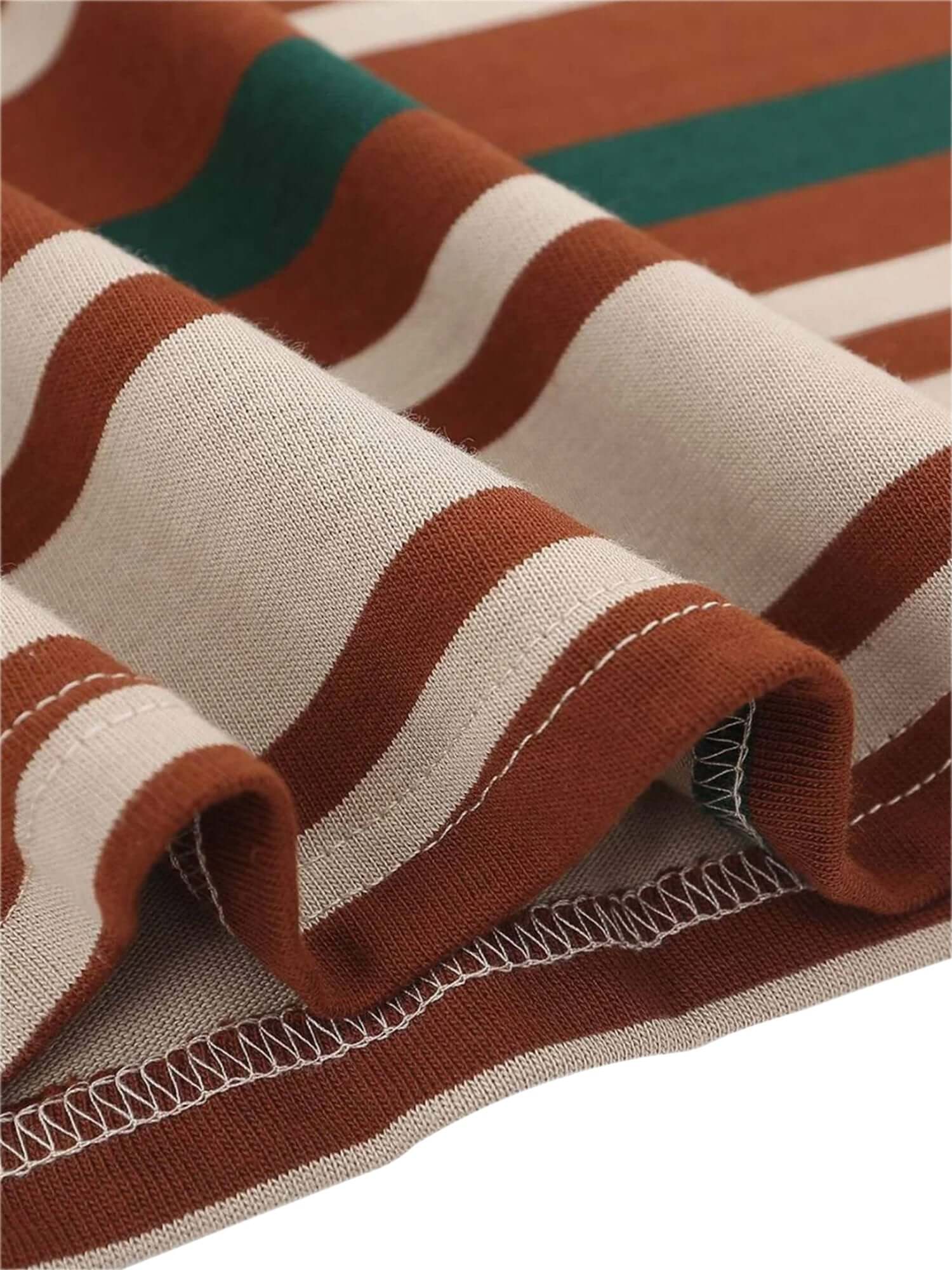 Keep it timeless with the Vintage Striped Polo Shirt — a perfect blend of comfort and classic style. Crafted from a breathable cotton blend, this short-sleeved polo features bold horizontal stripes, a clean button placket, and a contrast collar that adds