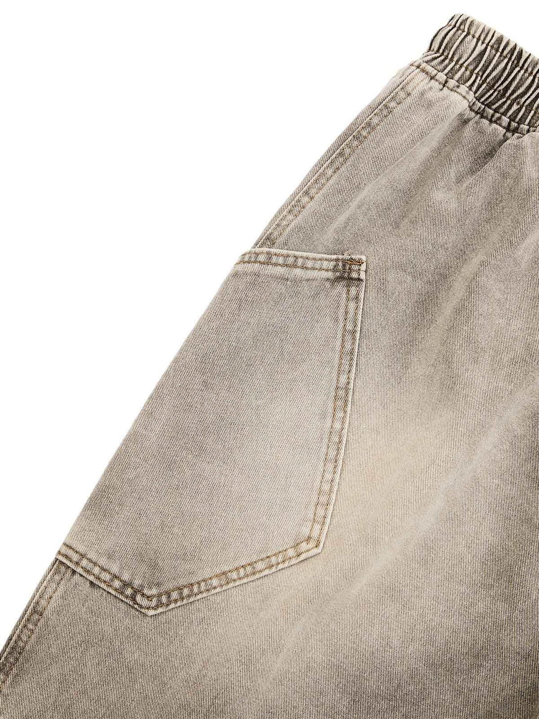 Bring effortless edge to your casual wardrobe with the Vintage Wash Deconstructed Drawstring Denim Shorts. Made from premium denim, these relaxed-fit shorts feature an elastic waistband with an adjustable drawstring for maximum comfort and flexibility. Th