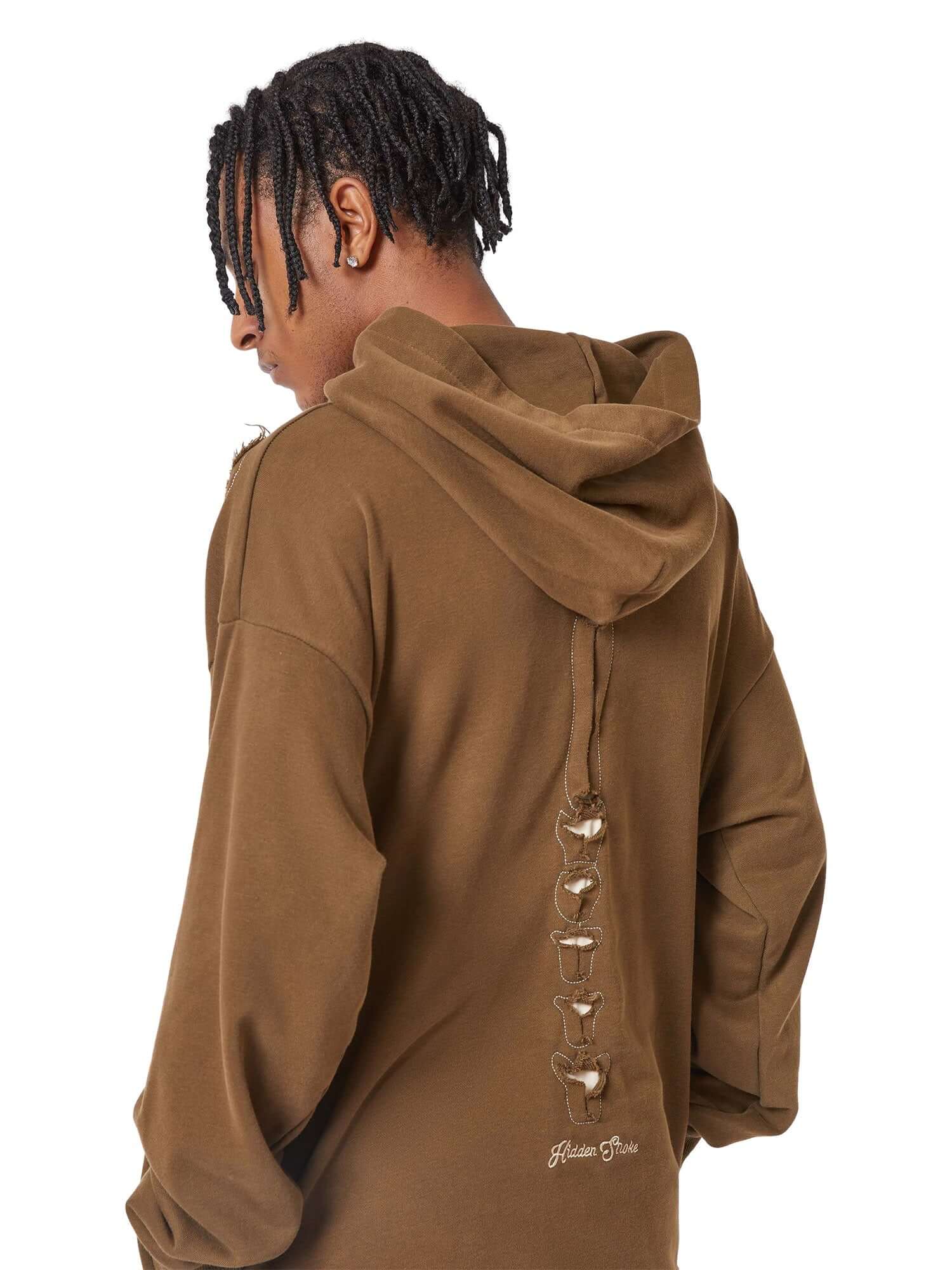 Make a bold statement with the Washed And Aged Hooded Sweatshirt — a cozy, oversized piece featuring a striking rib cage design. Crafted from a soft cotton blend, this hoodie blends comfort and attitude with its spooky, skeleton-inspired graphic. Perfect