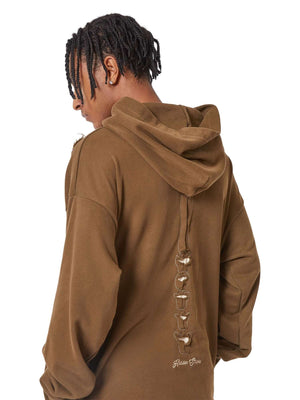 Make a bold statement with the Washed And Aged Hooded Sweatshirt — a cozy, oversized piece featuring a striking rib cage design. Crafted from a soft cotton blend, this hoodie blends comfort and attitude with its spooky, skeleton-inspired graphic. Perfect