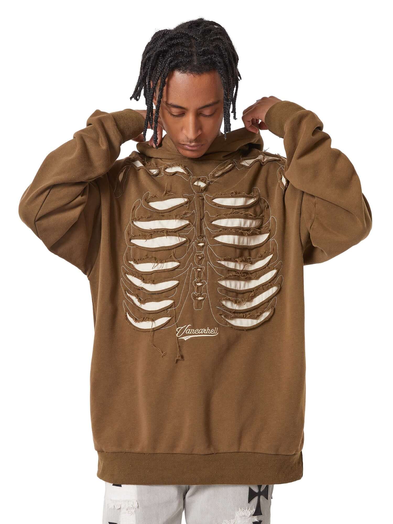 Make a bold statement with the Washed And Aged Hooded Sweatshirt — a cozy, oversized piece featuring a striking rib cage design. Crafted from a soft cotton blend, this hoodie blends comfort and attitude with its spooky, skeleton-inspired graphic. Perfect