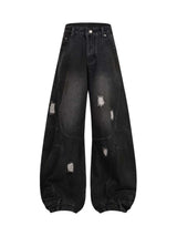 Add effortless edge to your look with the Washed Distressed Jeans. Made from durable denim, these wide-leg jeans feature distressed details for a bold, worn-in street style vibe. The elastic waistband ensures a comfortable, flexible fit — perfect for casu
