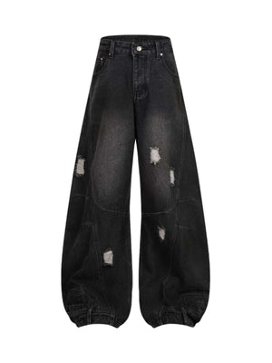 Add effortless edge to your look with the Washed Distressed Jeans. Made from durable denim, these wide-leg jeans feature distressed details for a bold, worn-in street style vibe. The elastic waistband ensures a comfortable, flexible fit — perfect for casu