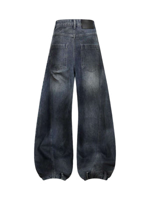 Add effortless edge to your look with the Washed Distressed Jeans. Made from durable denim, these wide-leg jeans feature distressed details for a bold, worn-in street style vibe. The elastic waistband ensures a comfortable, flexible fit — perfect for casu