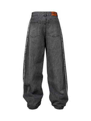 Upgrade your streetwear look with the Washed Distressed Raw Edge Baggy Jeans. Crafted from durable denim, these jeans feature a loose, relaxed fit with stylish side stripes and a raw edge finish for a bold, modern vibe. The elastic waistband ensures all-d
