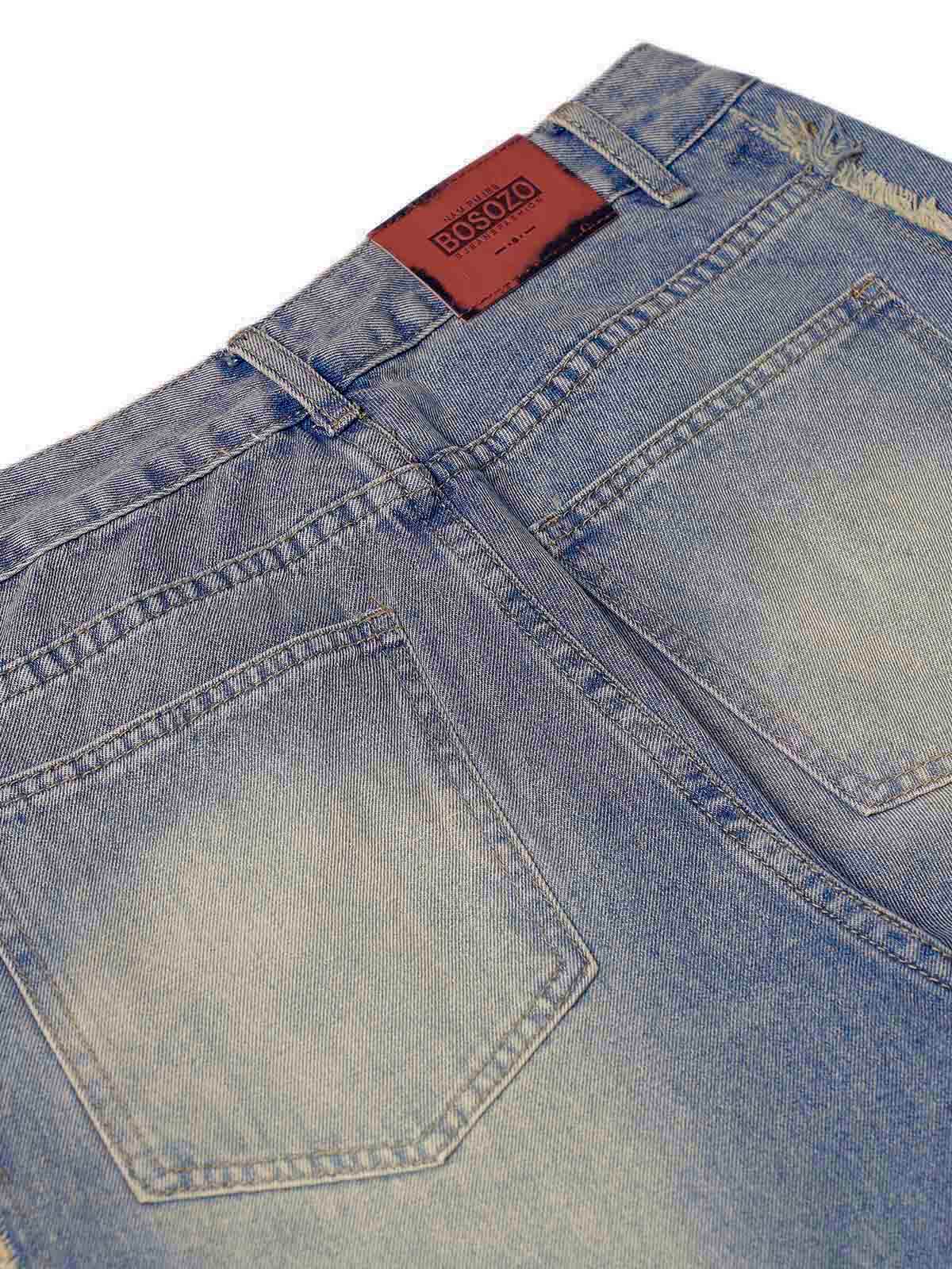 Upgrade your streetwear look with the Washed Distressed Raw Edge Baggy Jeans. Crafted from durable denim, these jeans feature a loose, relaxed fit with stylish side stripes and a raw edge finish for a bold, modern vibe. The elastic waistband ensures all-d