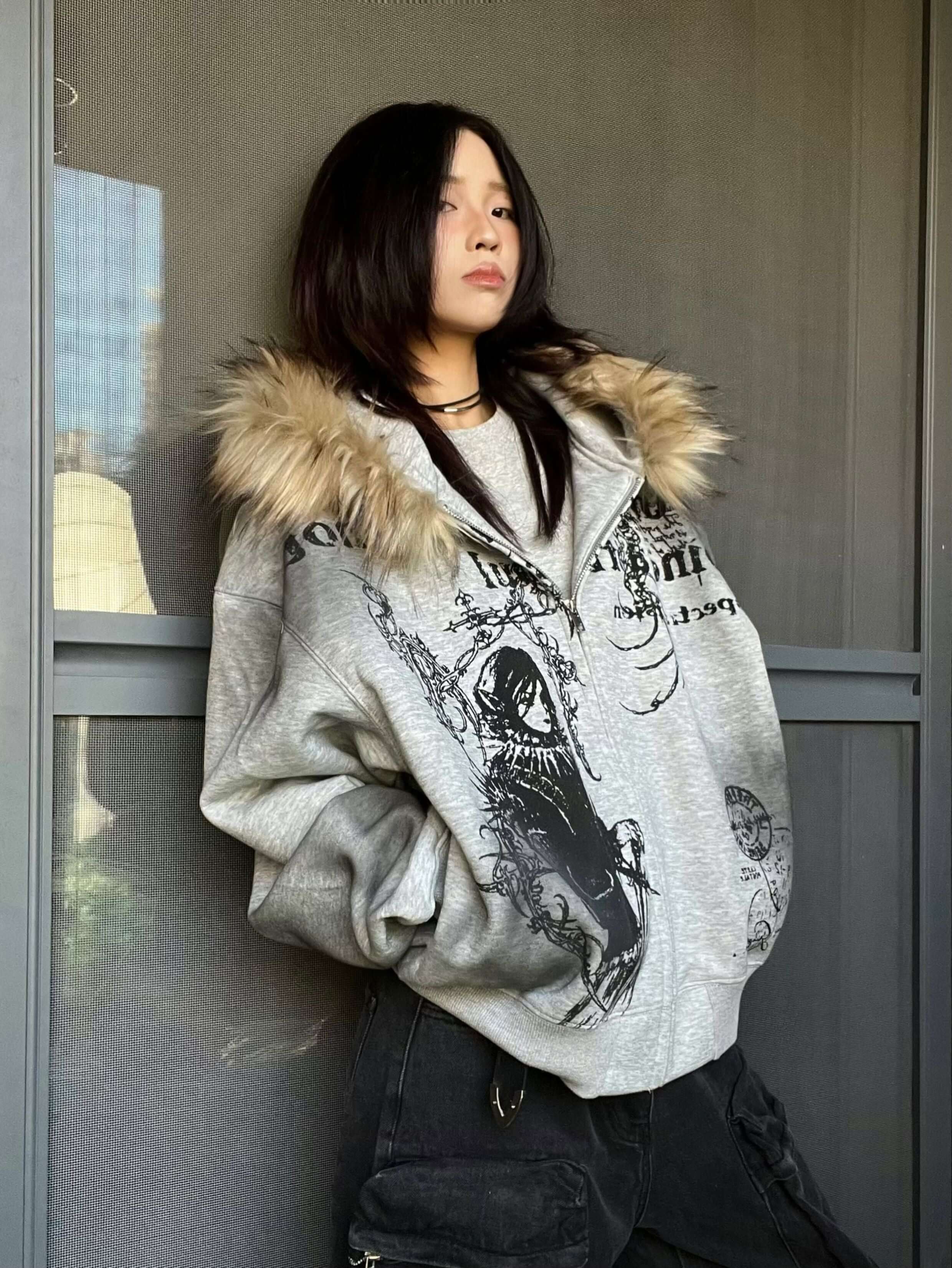 Stay warm and on-trend with the Wasteland Style Cardigan Zip Up Fur Hooded Jacket. Crafted from a soft cotton blend with cozy faux fur trim, this jacket delivers a perfect balance of comfort, warmth, and standout street style. Featuring a drawstring hood,