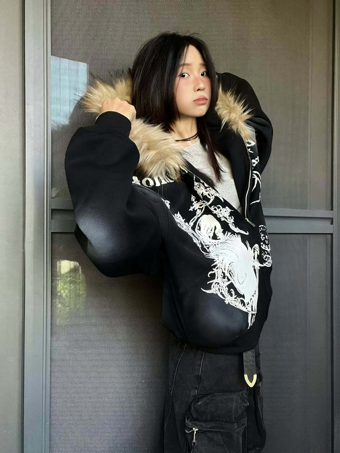 Stay warm and on-trend with the Wasteland Style Cardigan Zip Up Fur Hooded Jacket. Crafted from a soft cotton blend with cozy faux fur trim, this jacket delivers a perfect balance of comfort, warmth, and standout street style. Featuring a drawstring hood,