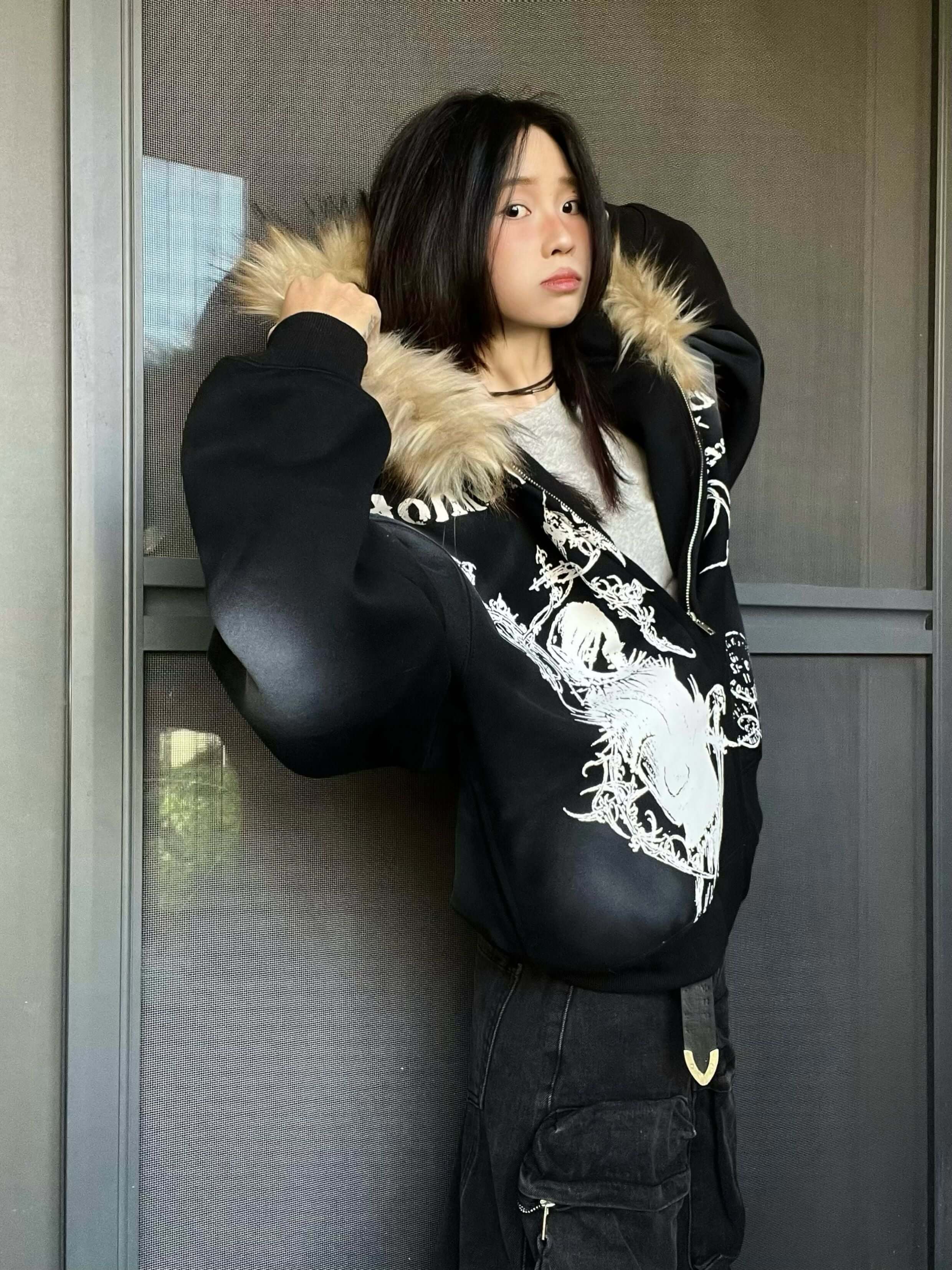 Stay warm and on-trend with the Wasteland Style Cardigan Zip Up Fur Hooded Jacket. Crafted from a soft cotton blend with cozy faux fur trim, this jacket delivers a perfect balance of comfort, warmth, and standout street style. Featuring a drawstring hood,