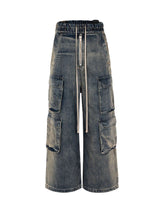 Elevate your casual style with the Wide Leg Multi Pocket Straight Leg Loose Jeans. Crafted from durable denim, these jeans feature a relaxed wide-leg silhouette, multiple side pockets for practicality, and an adjustable drawstring for a customizable fit.