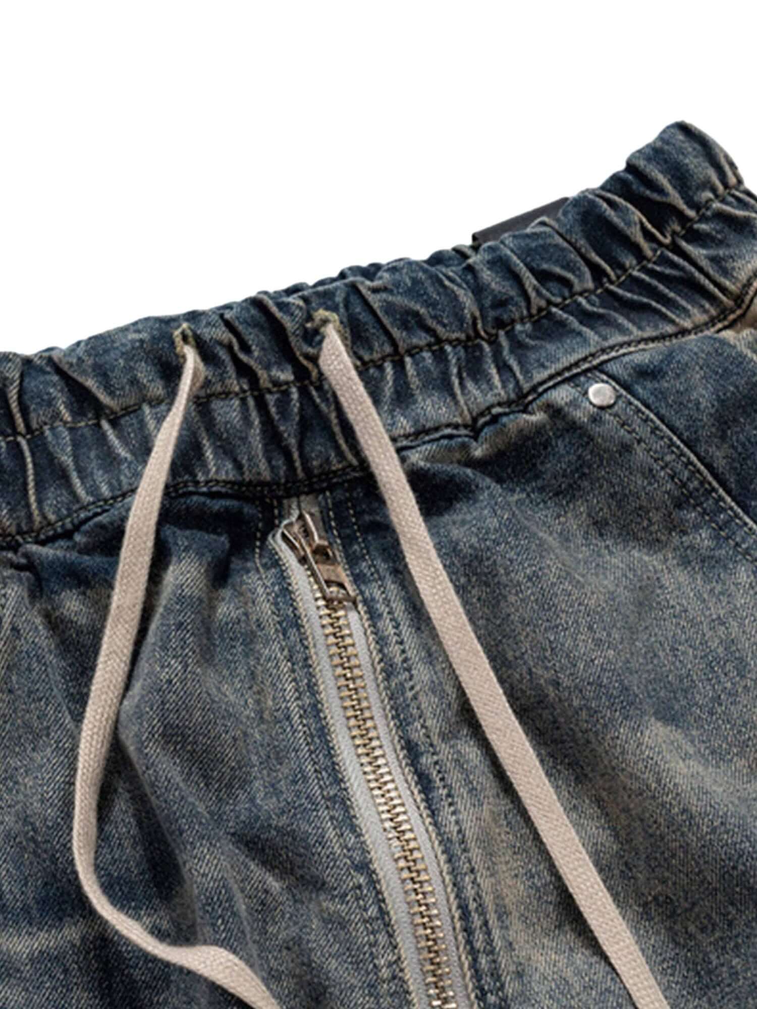 Elevate your casual style with the Wide Leg Multi Pocket Straight Leg Loose Jeans. Crafted from durable denim, these jeans feature a relaxed wide-leg silhouette, multiple side pockets for practicality, and an adjustable drawstring for a customizable fit.