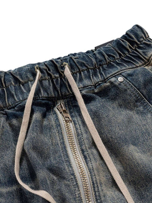 Elevate your casual style with the Wide Leg Multi Pocket Straight Leg Loose Jeans. Crafted from durable denim, these jeans feature a relaxed wide-leg silhouette, multiple side pockets for practicality, and an adjustable drawstring for a customizable fit.