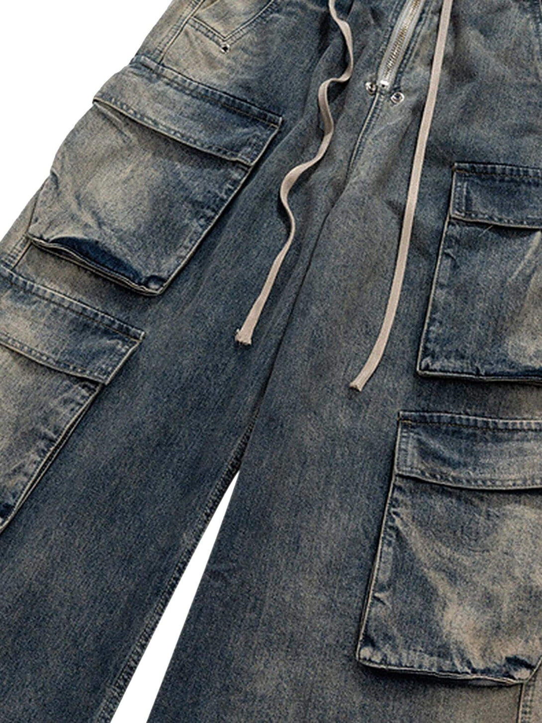 Elevate your casual style with the Wide Leg Multi Pocket Straight Leg Loose Jeans. Crafted from durable denim, these jeans feature a relaxed wide-leg silhouette, multiple side pockets for practicality, and an adjustable drawstring for a customizable fit.