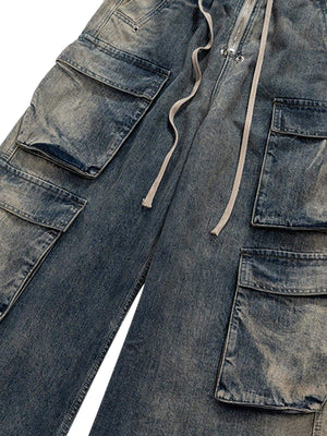 Elevate your casual style with the Wide Leg Multi Pocket Straight Leg Loose Jeans. Crafted from durable denim, these jeans feature a relaxed wide-leg silhouette, multiple side pockets for practicality, and an adjustable drawstring for a customizable fit.
