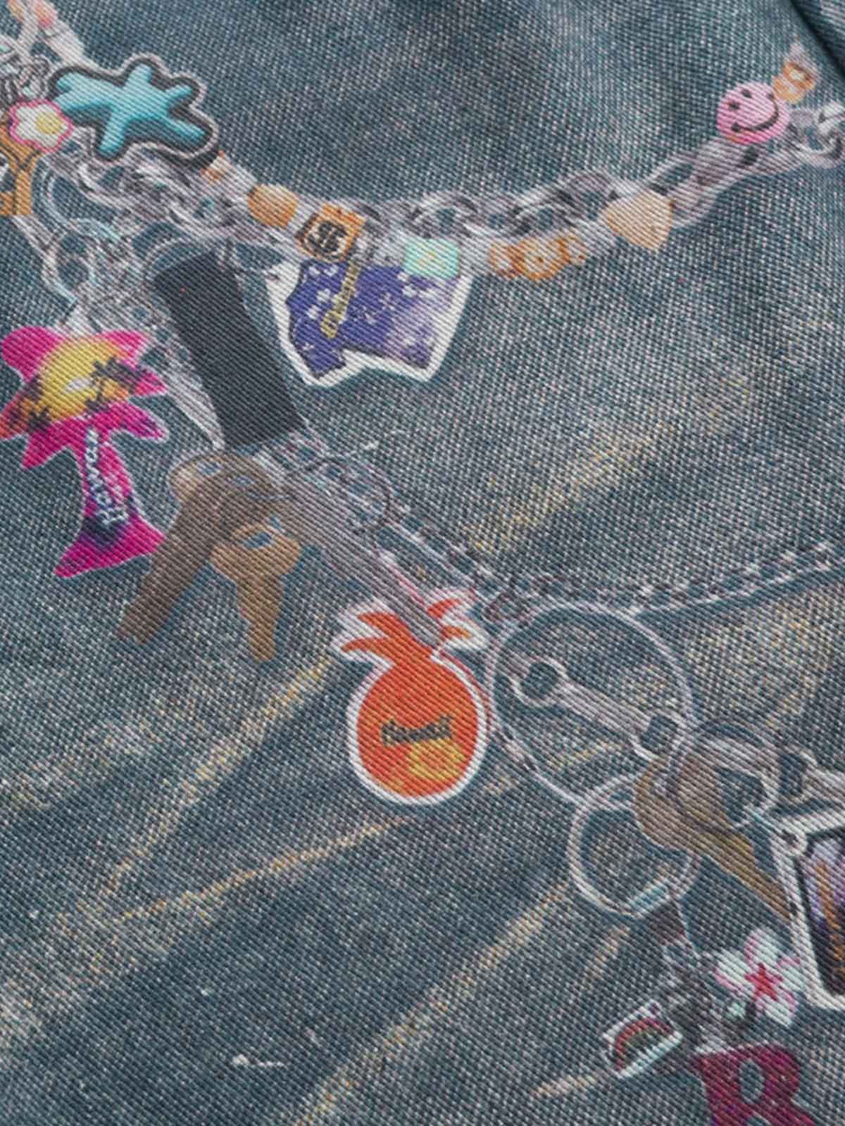 Charm print ripped jeans – charm print close-up | XoKool