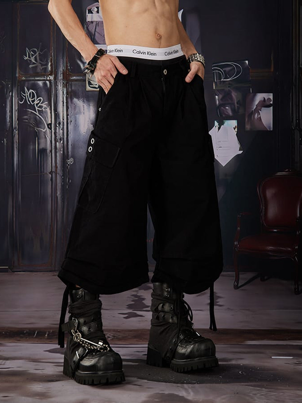Pleated cargo shorts – Black on model, front | XoKool