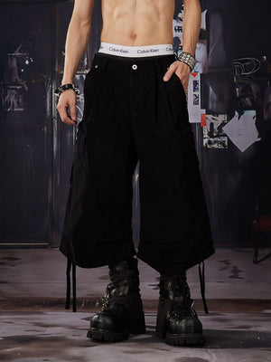 Pleated cargo shorts – Black on model, front | XoKool