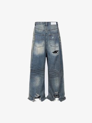 Baggy Ripped Jeans with Raw Hem – back flat | XoKool