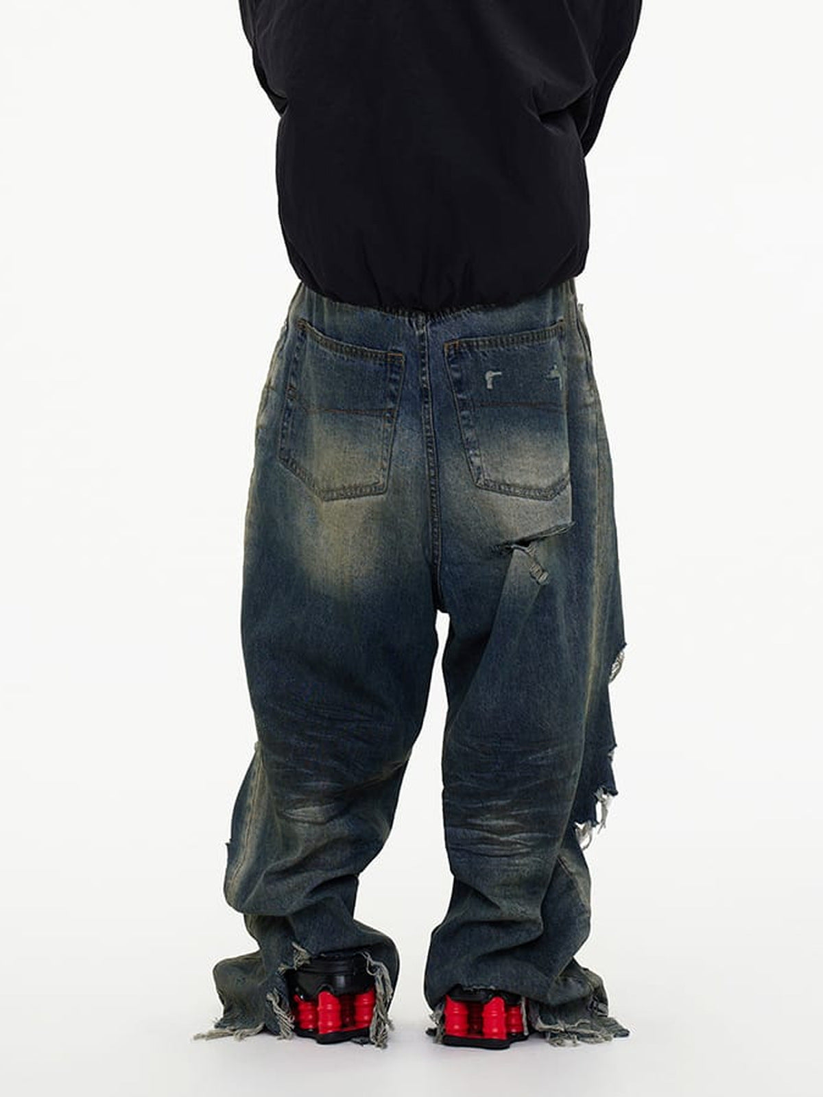 Baggy Ripped Jeans with Raw Hem – on model, back | XoKool