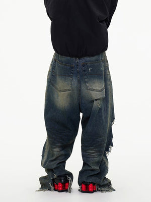 Baggy Ripped Jeans with Raw Hem – on model, back | XoKool