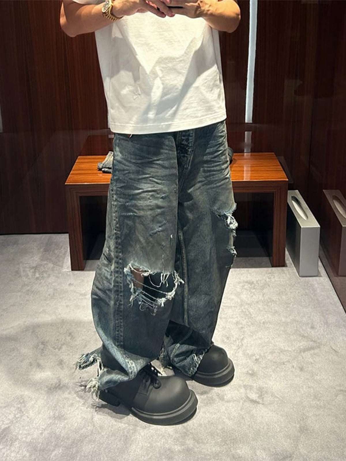 Ripped raw hem jeans – on model, indoor | XoKool