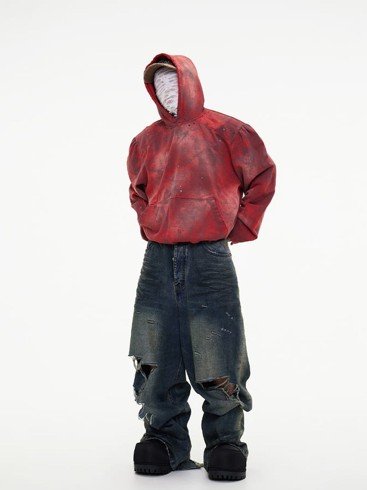 Ripped raw hem jeans – on model with red hoodie | XoKool