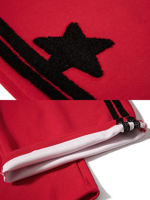 Star track pants – Red star and hem toggle close-up | XoKool