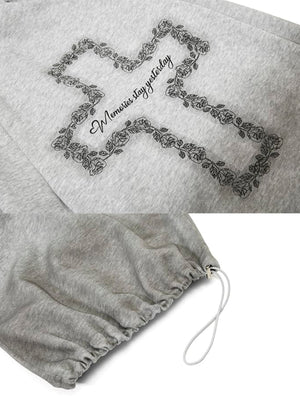 Barrel sweatpants – cross print and hem close-up | XoKool