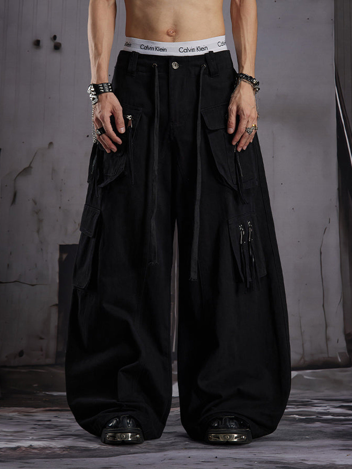 Black Baggy Cargo Pants with Multi Pockets – Black, on model front | XoKool