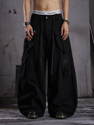 Black Baggy Cargo Pants with Multi Pockets – Black, on model front | XoKool