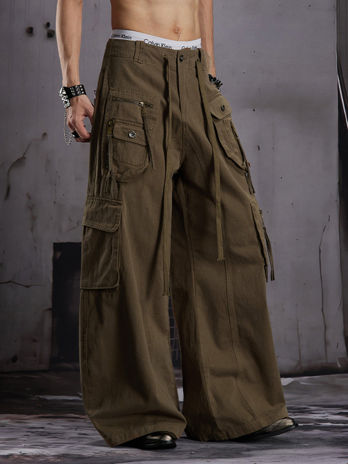 Baggy cargo pants – Olive Brown, on model front | XoKool
