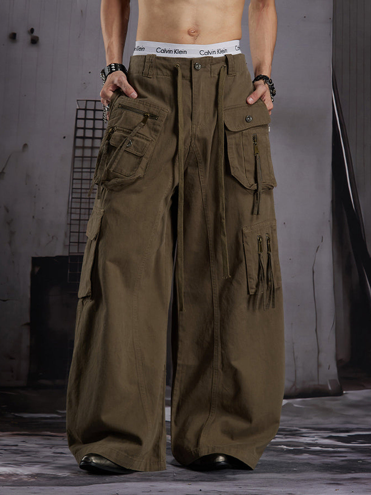 Baggy cargo pants – Olive Brown, on model front | XoKool