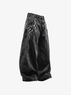 Schwarze Baggy Jeans mit Blitz-Stickerei – Seite flach | XoKool