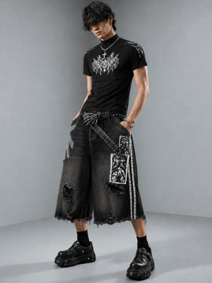 Black Baggy Jorts with Gothic Patch Prints – on model, front | XoKool