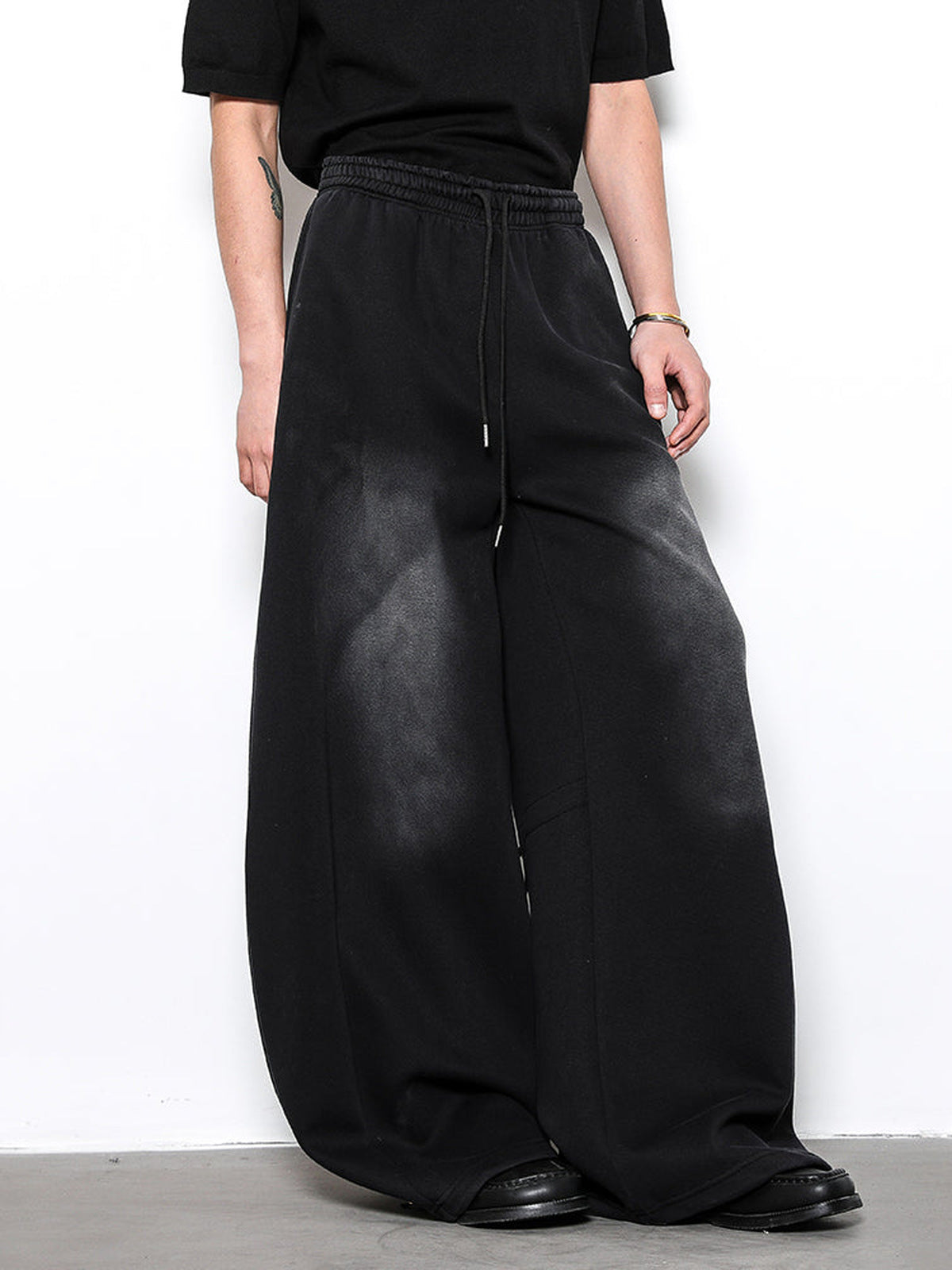 Washed Black Sweatpants – on model, front close | XoKool