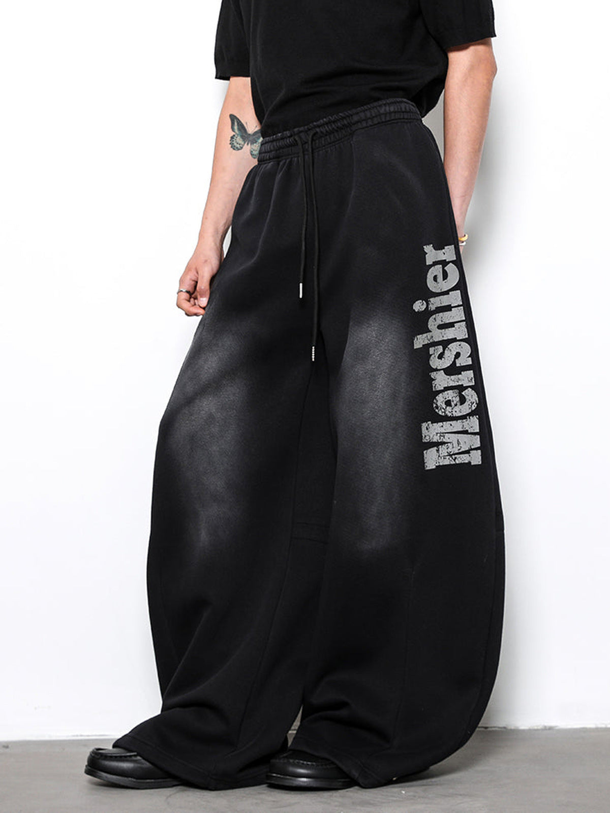 Washed Black Sweatpants – on model, side close | XoKool
