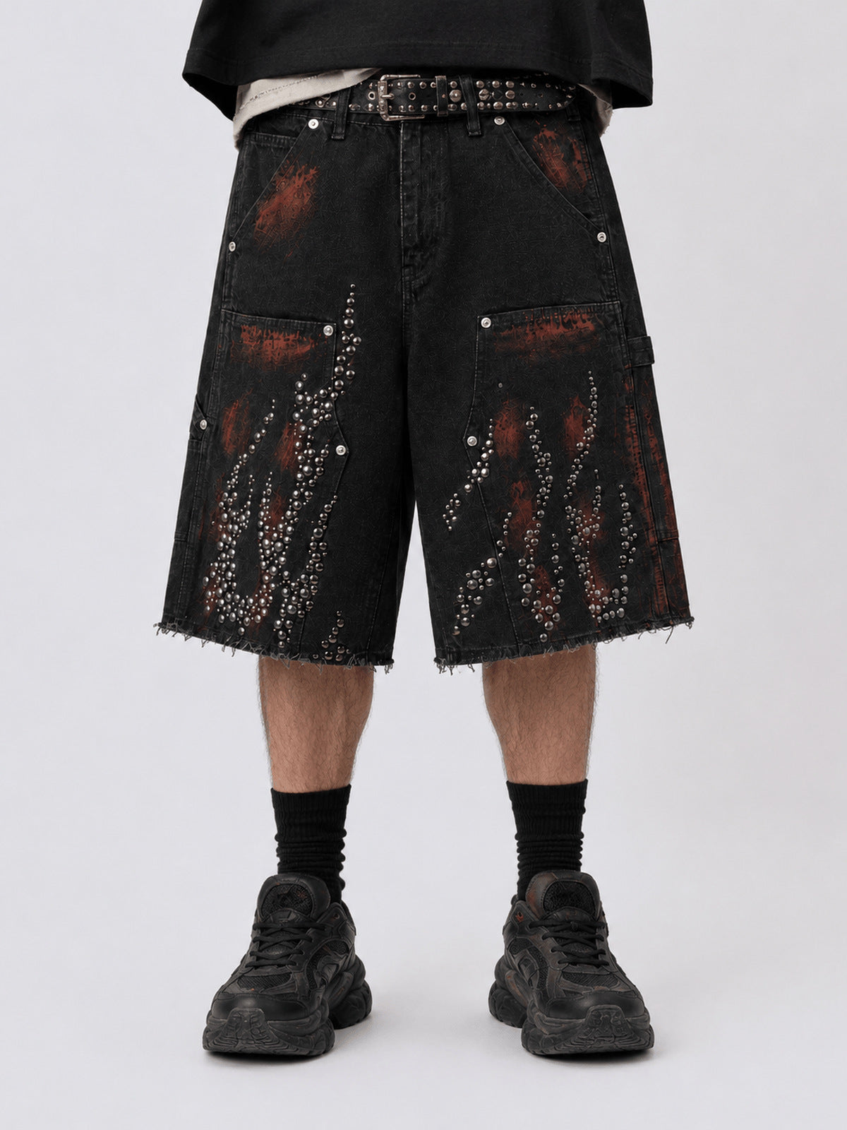 Studded flame jorts – on model, front lower | XoKool