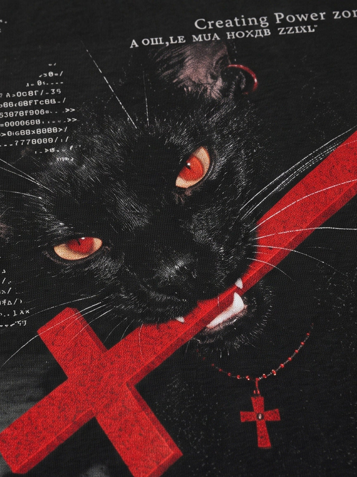 Black cat long sleeve tee – cat & red cross print close-up | XoKool