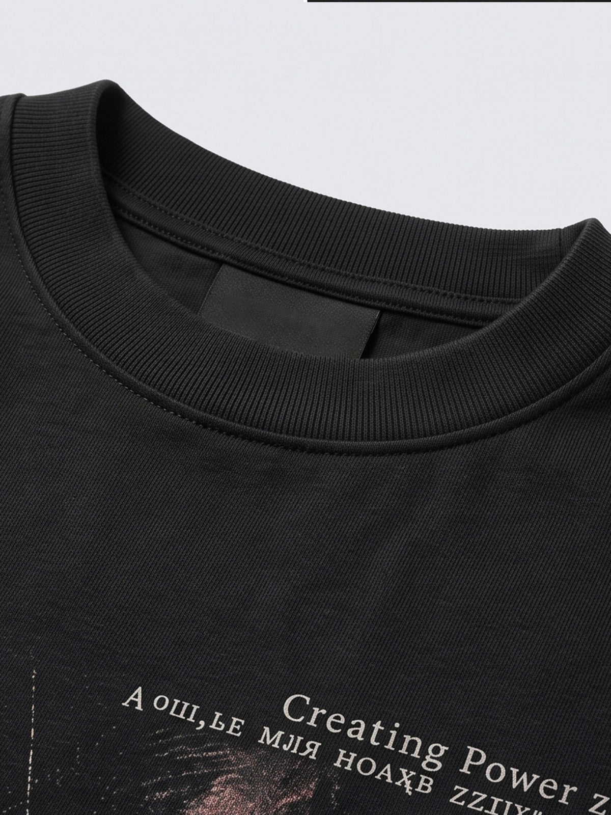 Black cat long sleeve tee – neckline + print close-up | XoKool