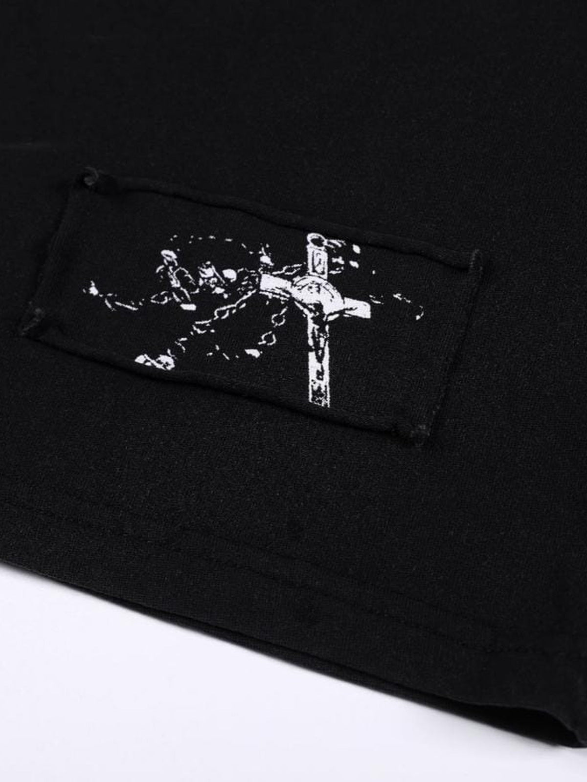 Cross cut-out tee – crucifix patch close-up | XoKool
