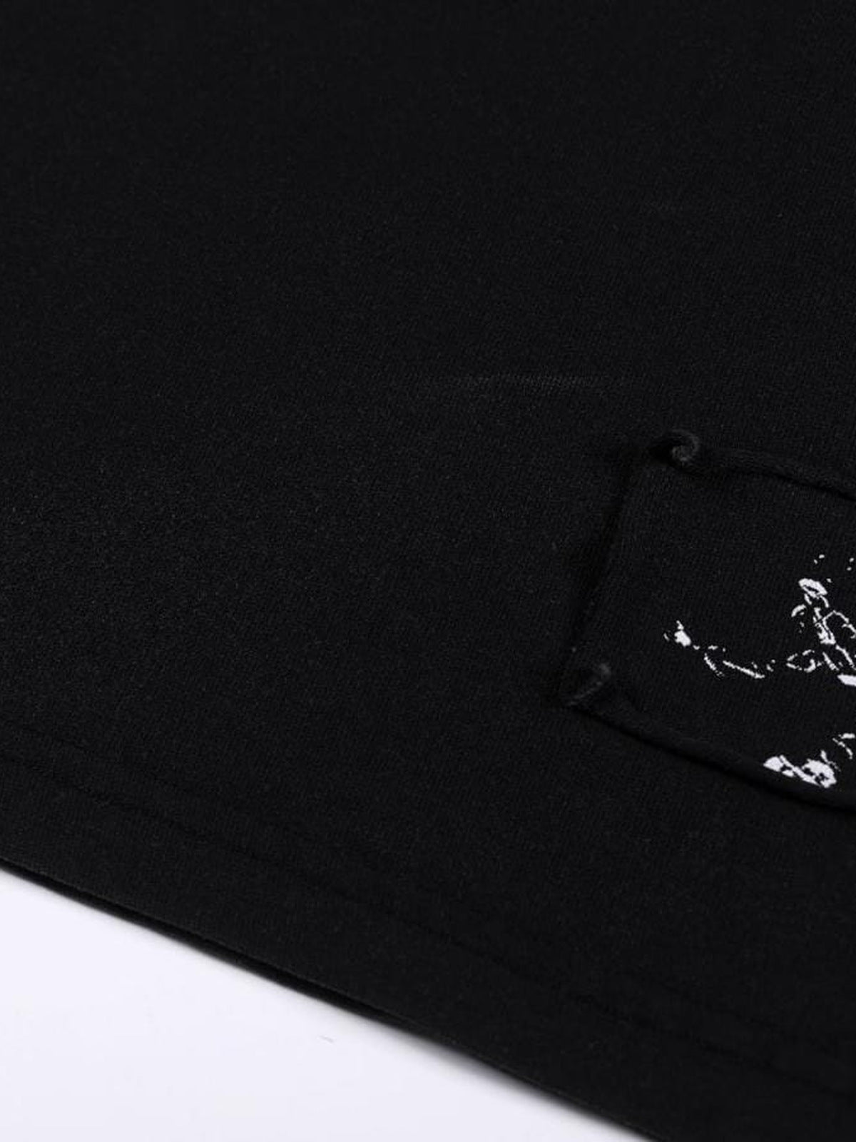 Cross cut-out tee – patch close-up | XoKool